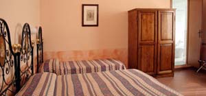 Standard triple with private facilities (bath and shower), and breakfast